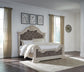 Bruchandi King Upholstered Panel Bed with Mirrored Dresser and Nightstand